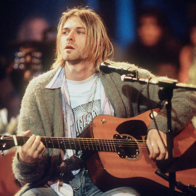 Skąd wziął się kardigan i jak stał się klasykiem męskiej i damskiej garderoby? Kurt Cobain w oliwkowym kardiganie